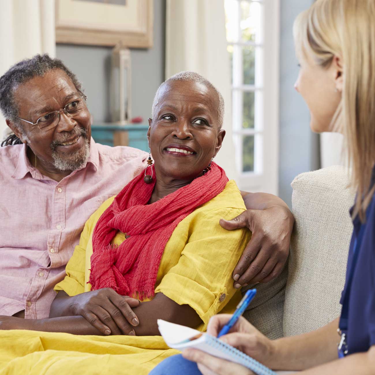 A companion care supervisor performing a free, in-home consultation with new clients.
